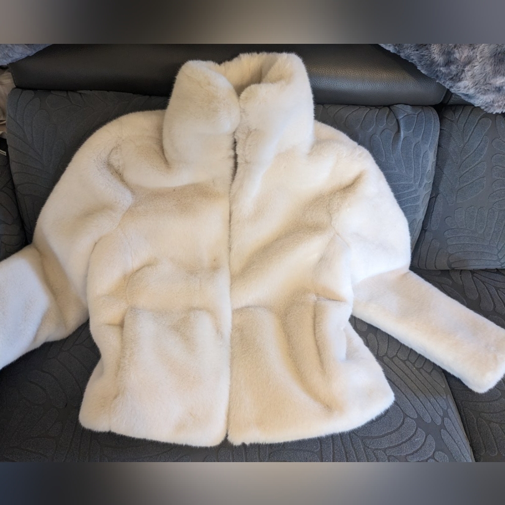 White faux fur coat
